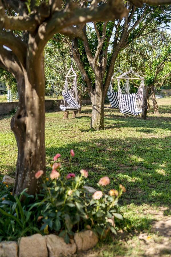 Camera Familiare con Vista Giardino
