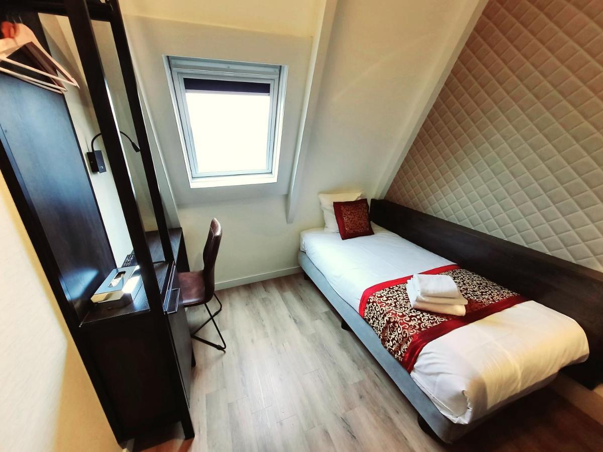 Camera Singola con Bagno in Comune