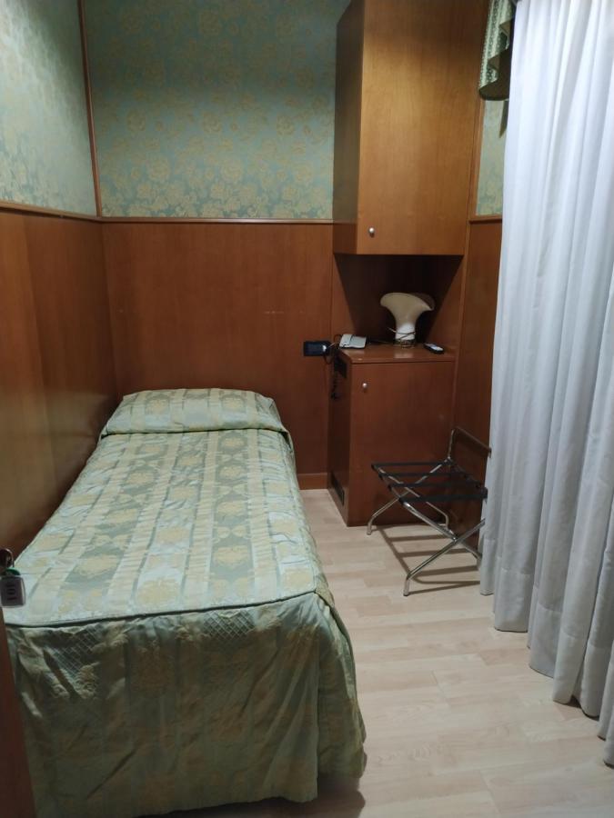 Camera Singola con Bagno Privato Esterno