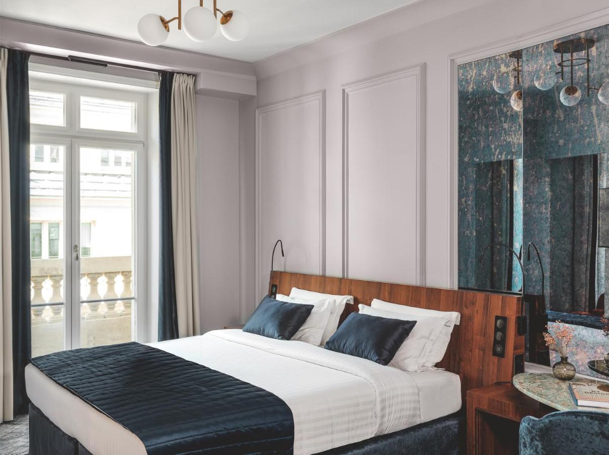 Camera Signature con balcone e 1 letto queen-size