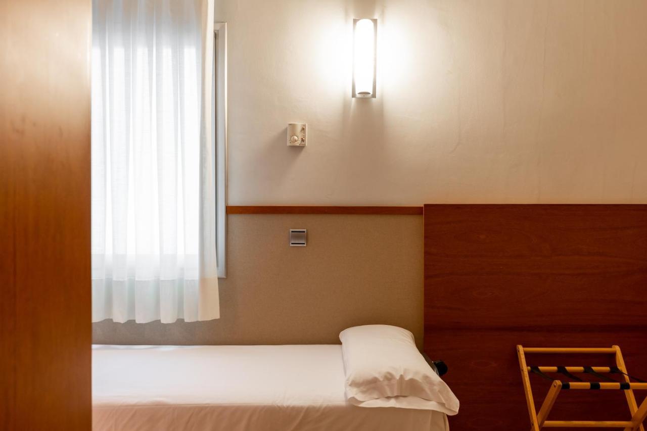 Camera Matrimoniale con Letto Supplementare