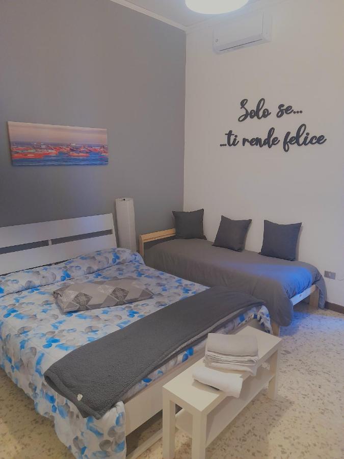Camera Tripla con Bagno in Comune
