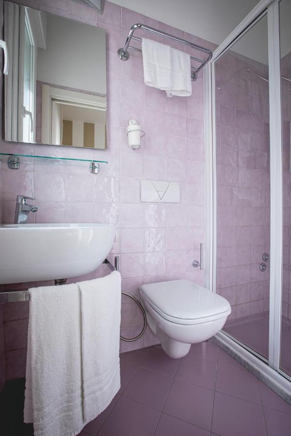 Triple Room with Balcony and Side Sea View,1408880744:JPEG
