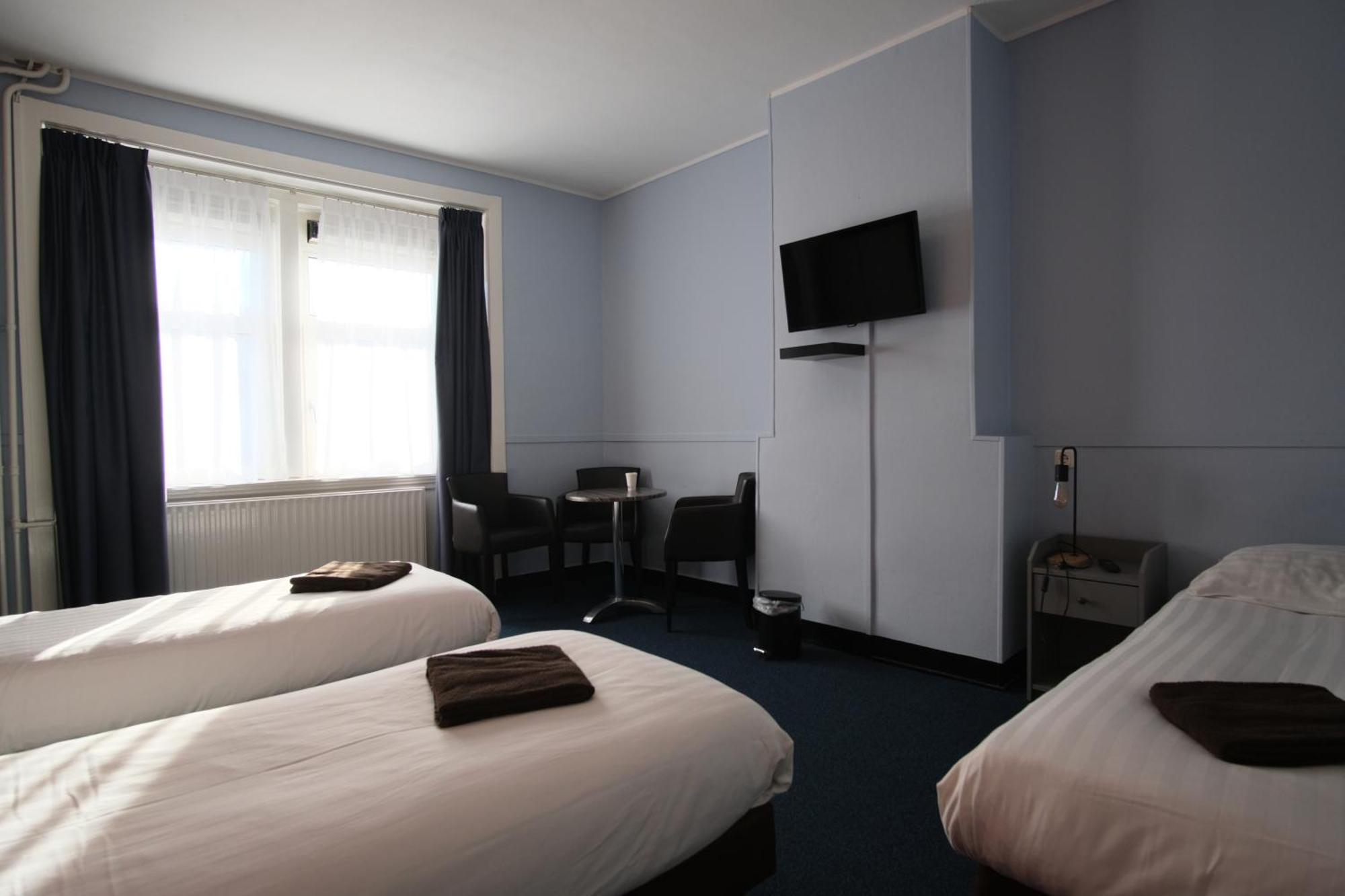 Camera Tripla con Bagno in Comune