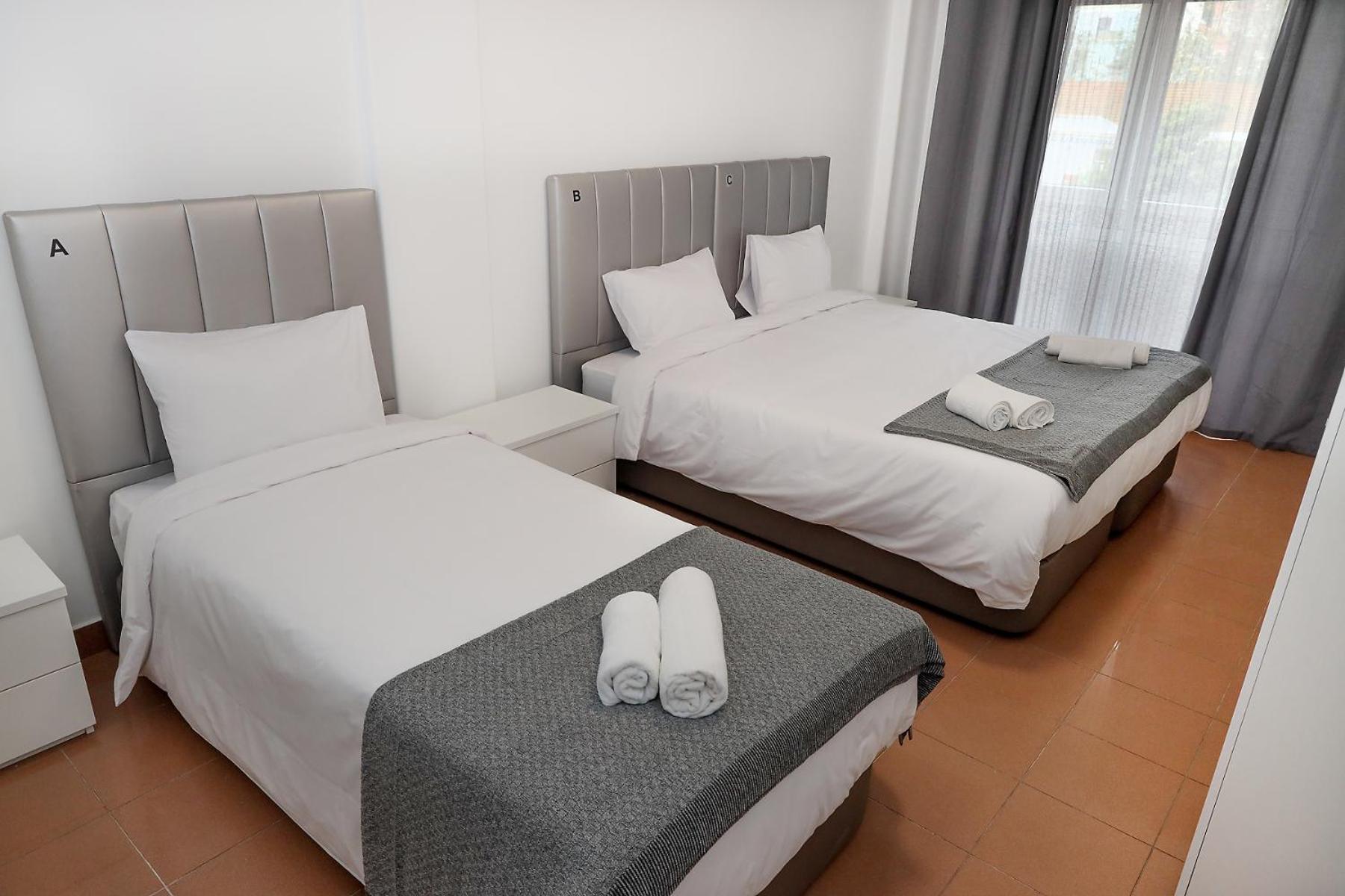 Camera Tripla Basic con Bagno in Comune