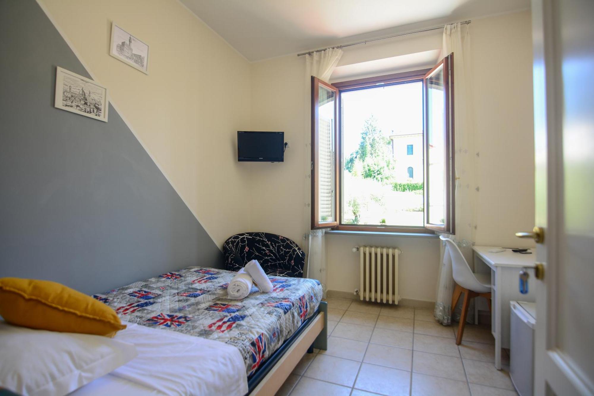 Camera Singola con Bagno Privato Esterno