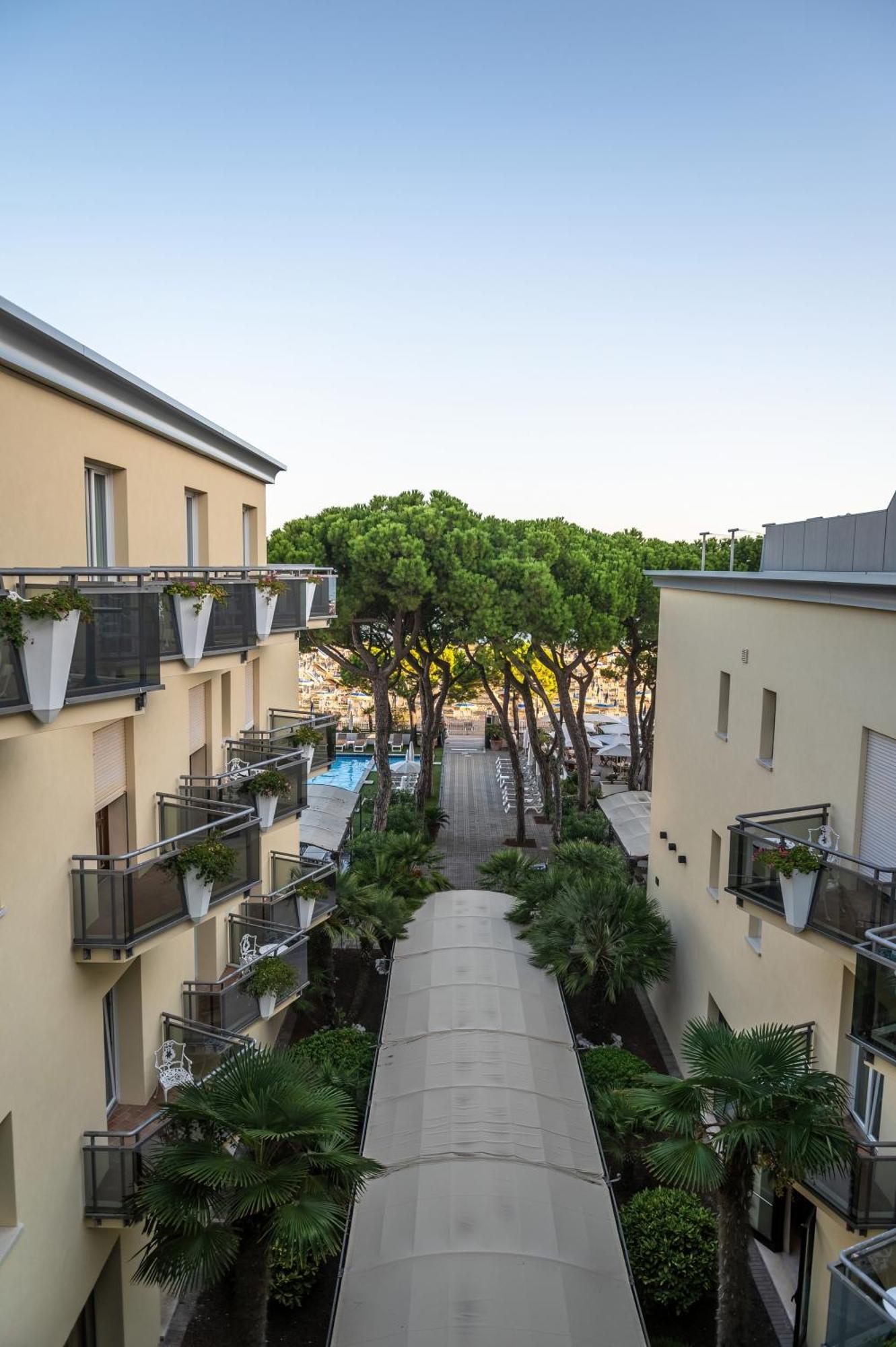 Deluxe Quadruple Room with Balcony Partial Sea View