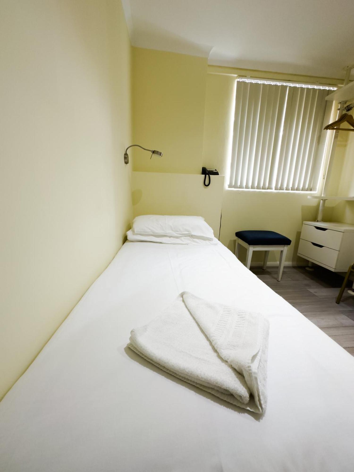 Camera Singola con Bagno in Comune