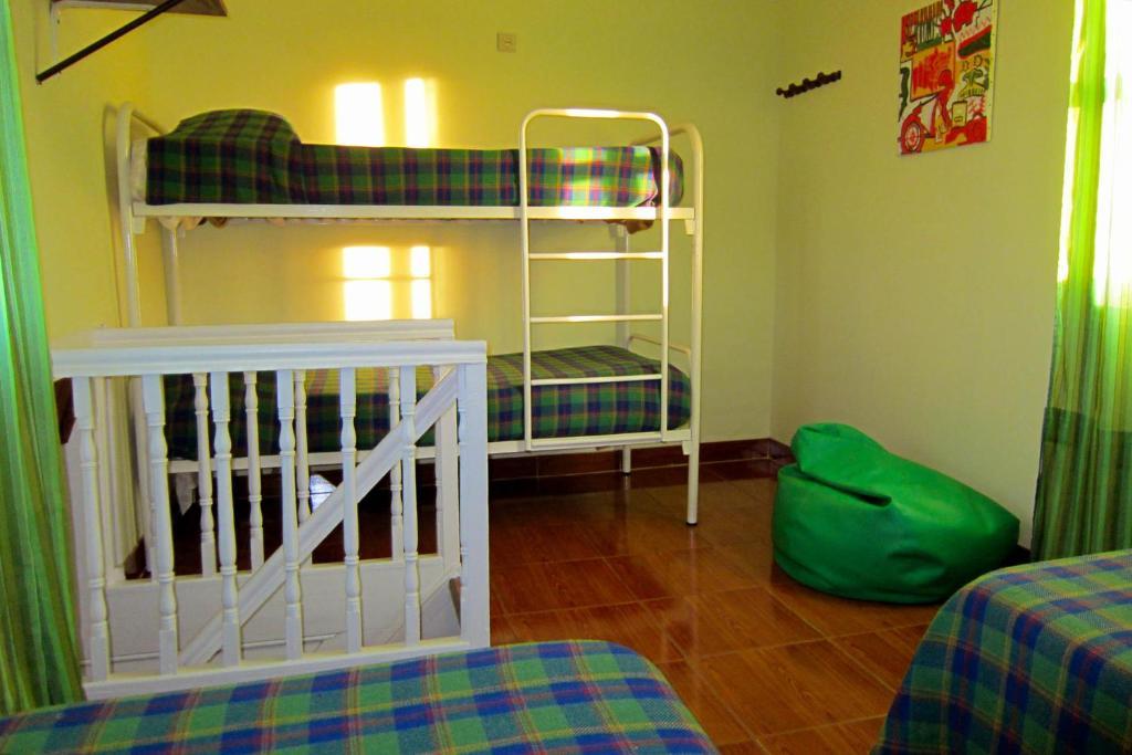 Camera Familiare con Bagno in Comune