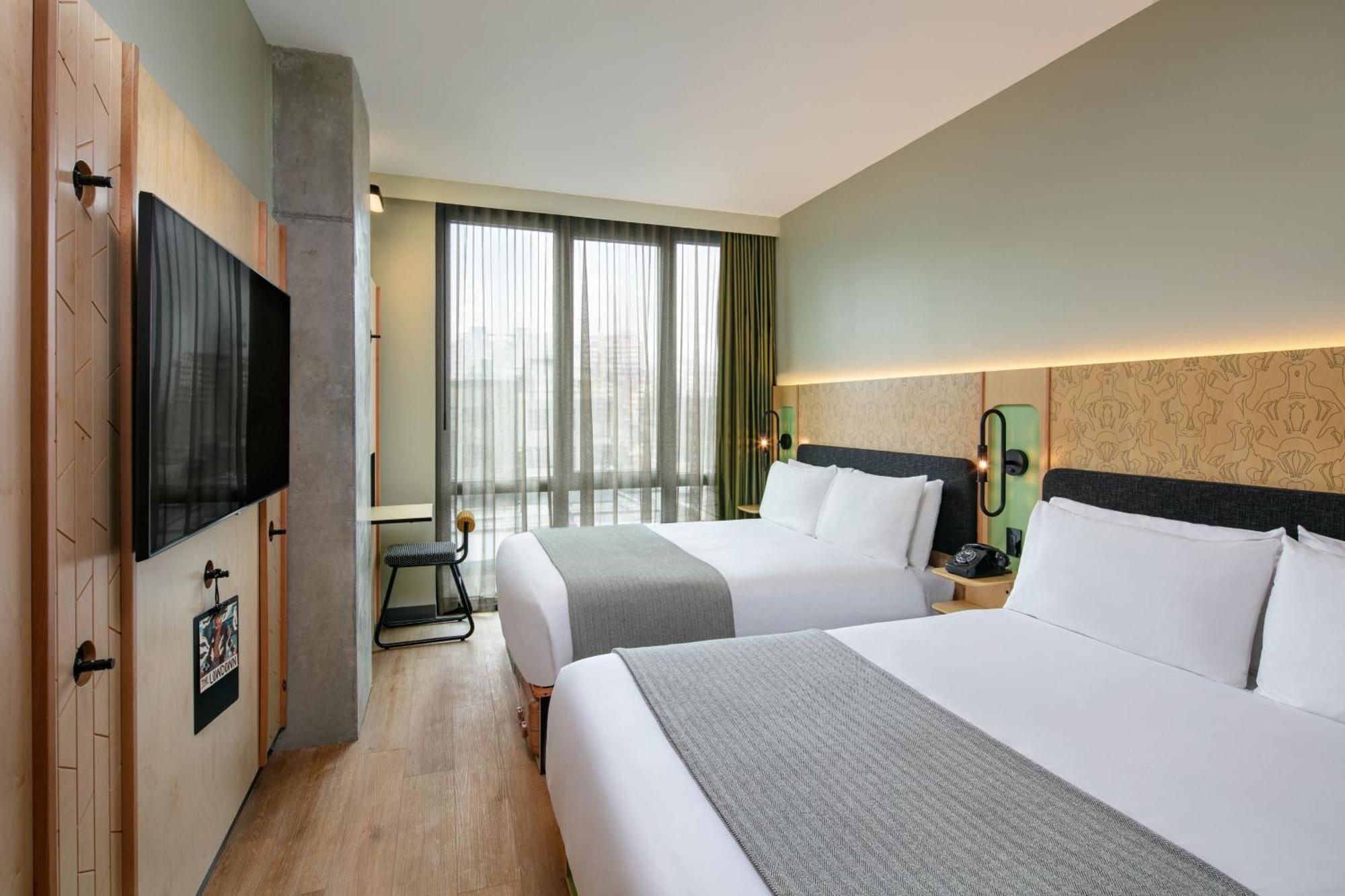 Queen Room with Two Queen Beds and City View - Hearing Accessible