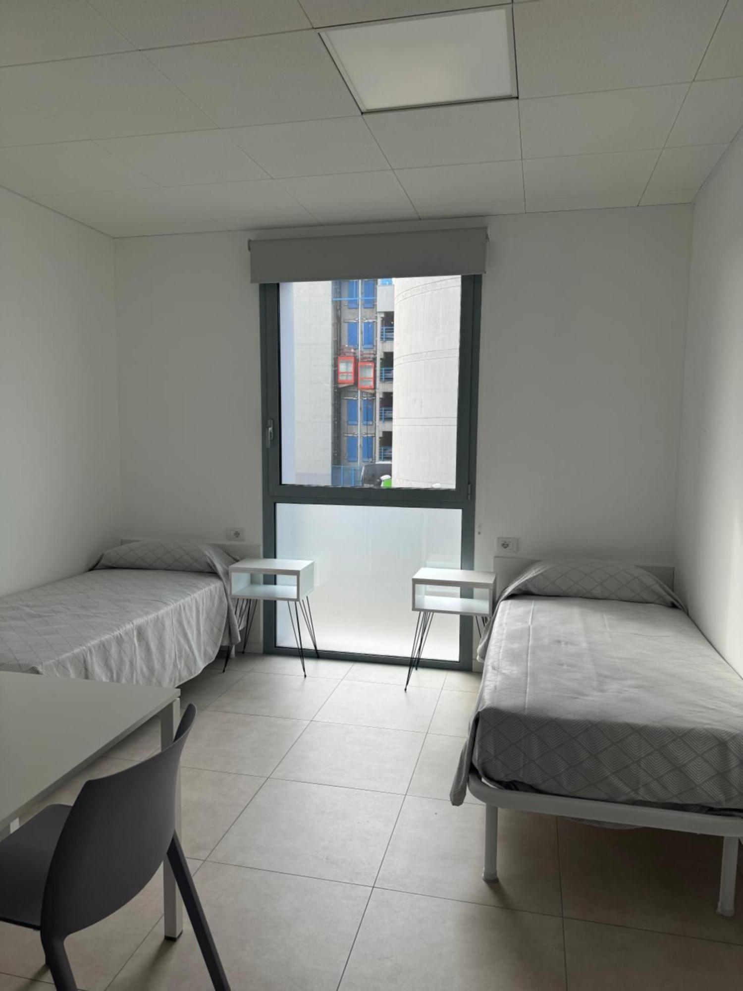 Camera Standard Doppia con Letti Singoli con Bagno in Comune
