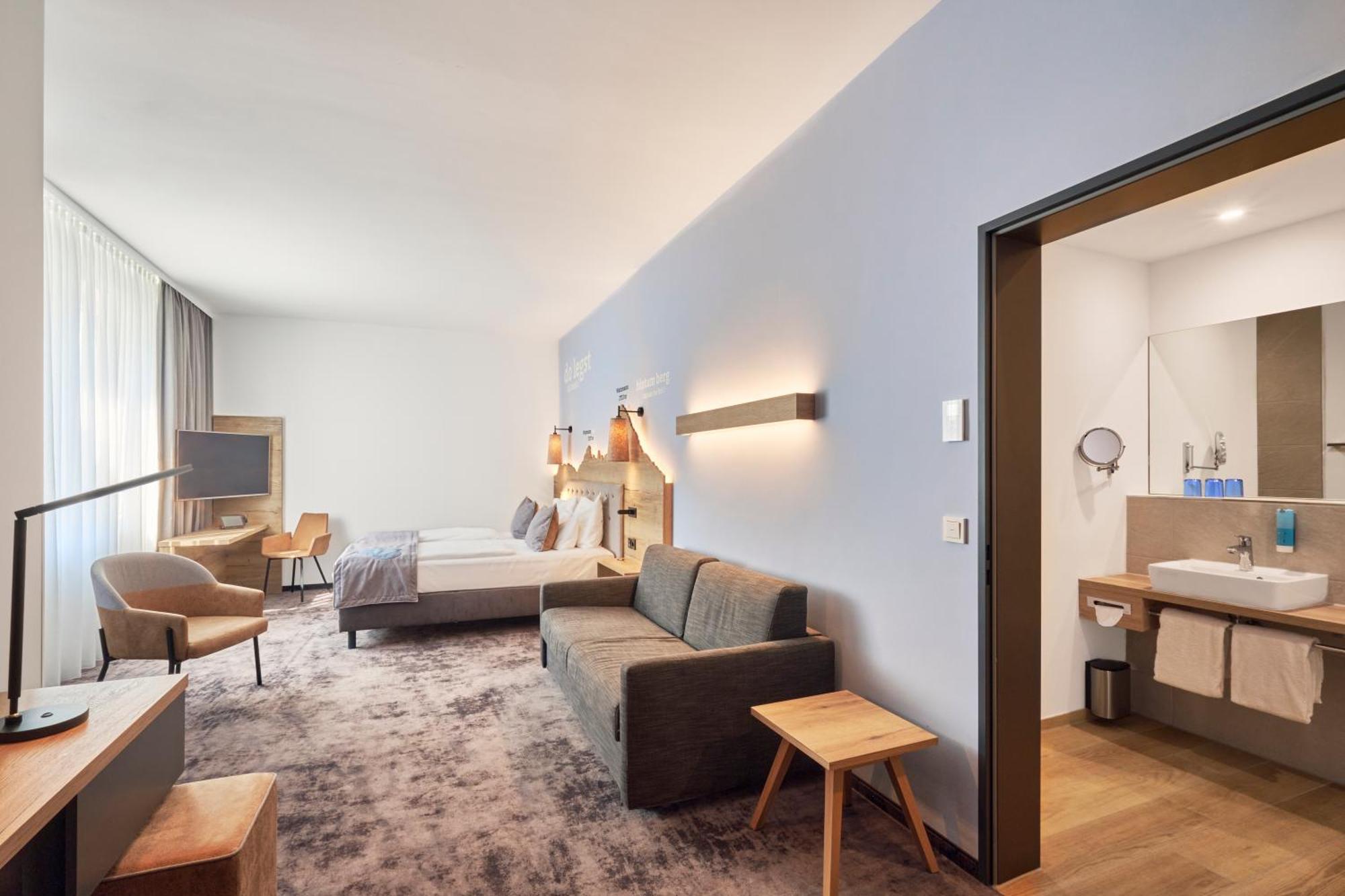 Junior Suite con cabina doccia e divano letto