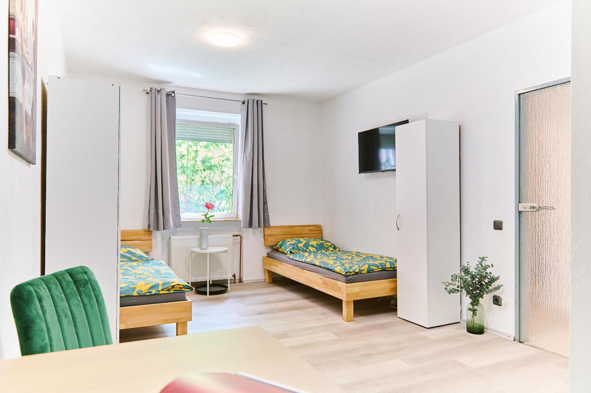 Camera Tripla con Bagno in Comune
