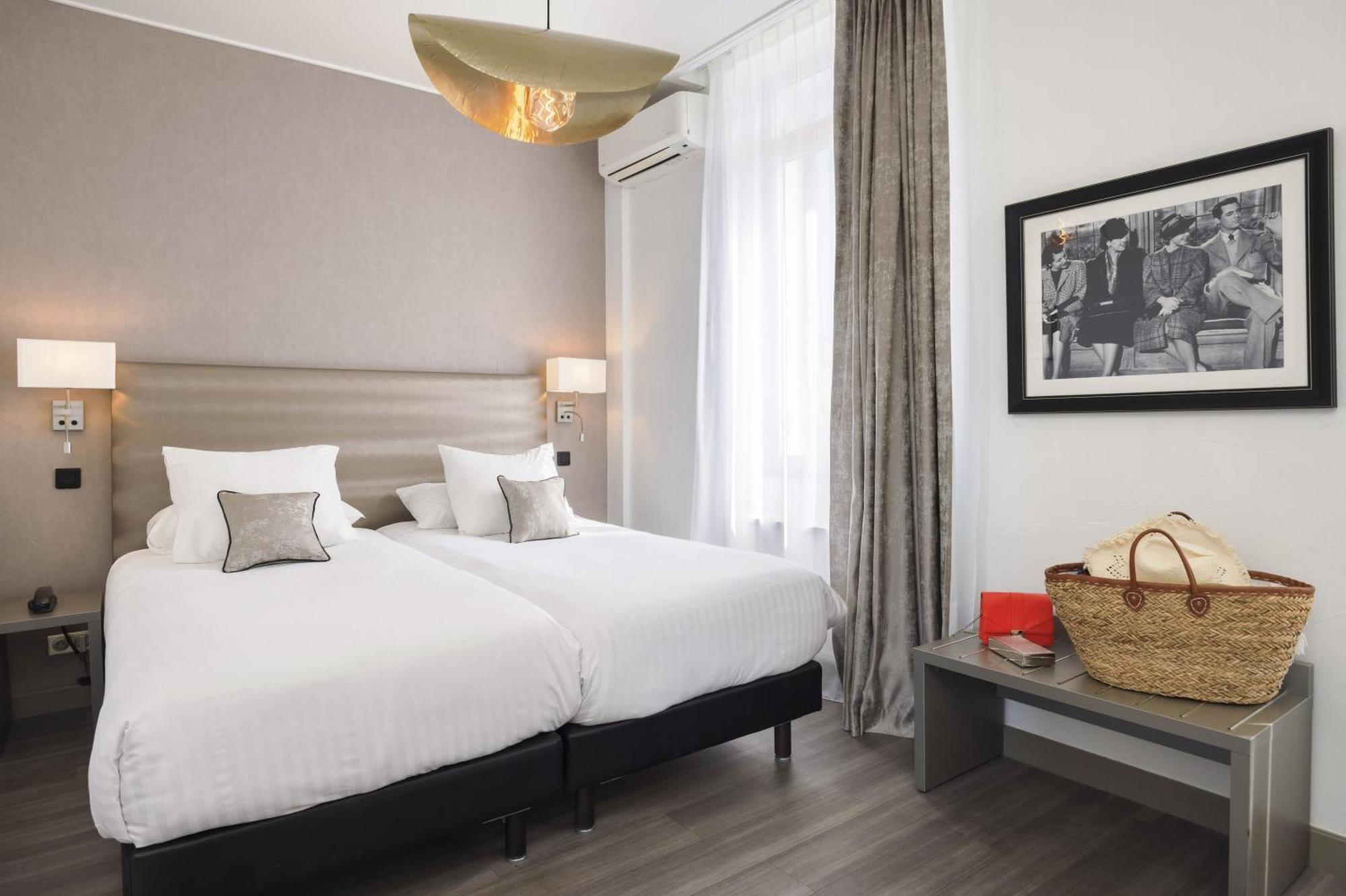 Camera Deluxe con 1 Letto Queen-Size e 1 Letto Singolo - Non Fumatori