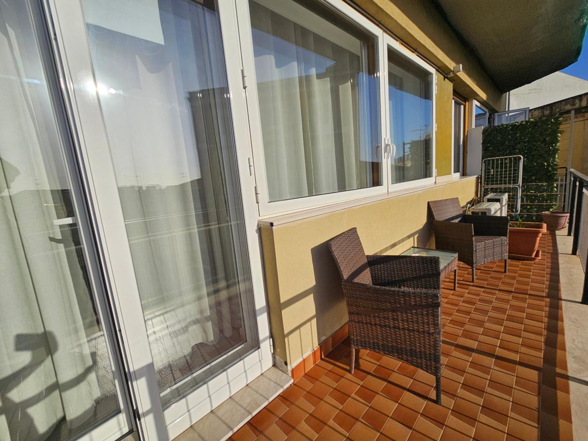 Camera Tripla con Balcone
