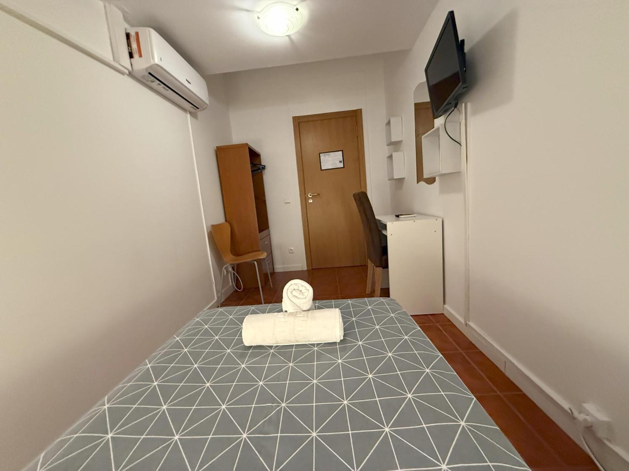 Camera Singola con Bagno in Comune