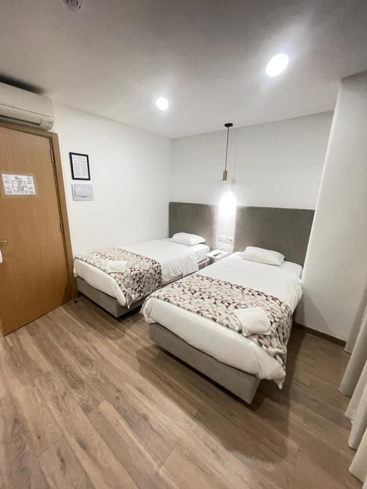 Camera Matrimoniale/Doppia con Letti Singoli con Letto Supplementare