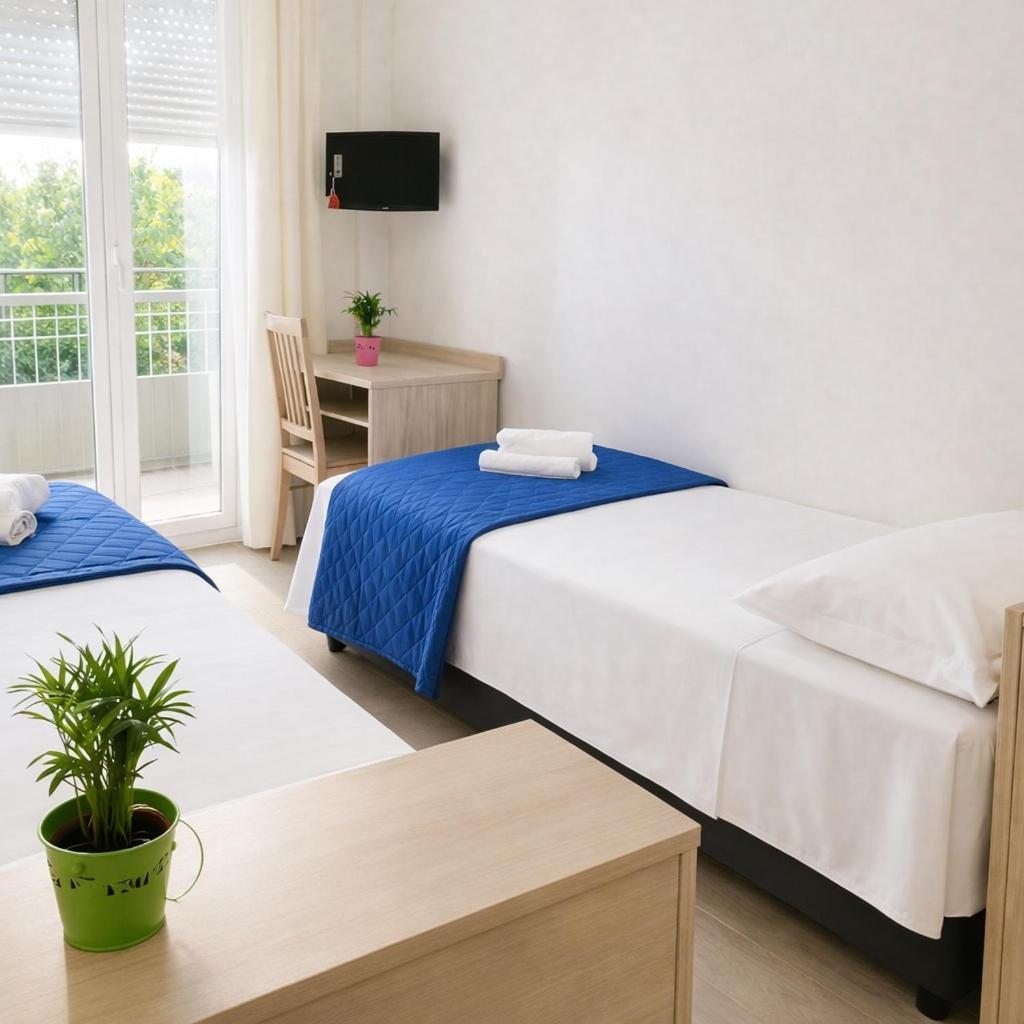 Camera Doppia con Letti Singoli con Balcone