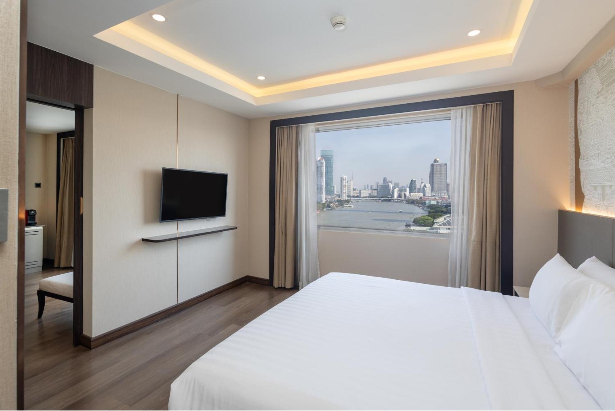 Suite King con Balcone e Vista Fiume