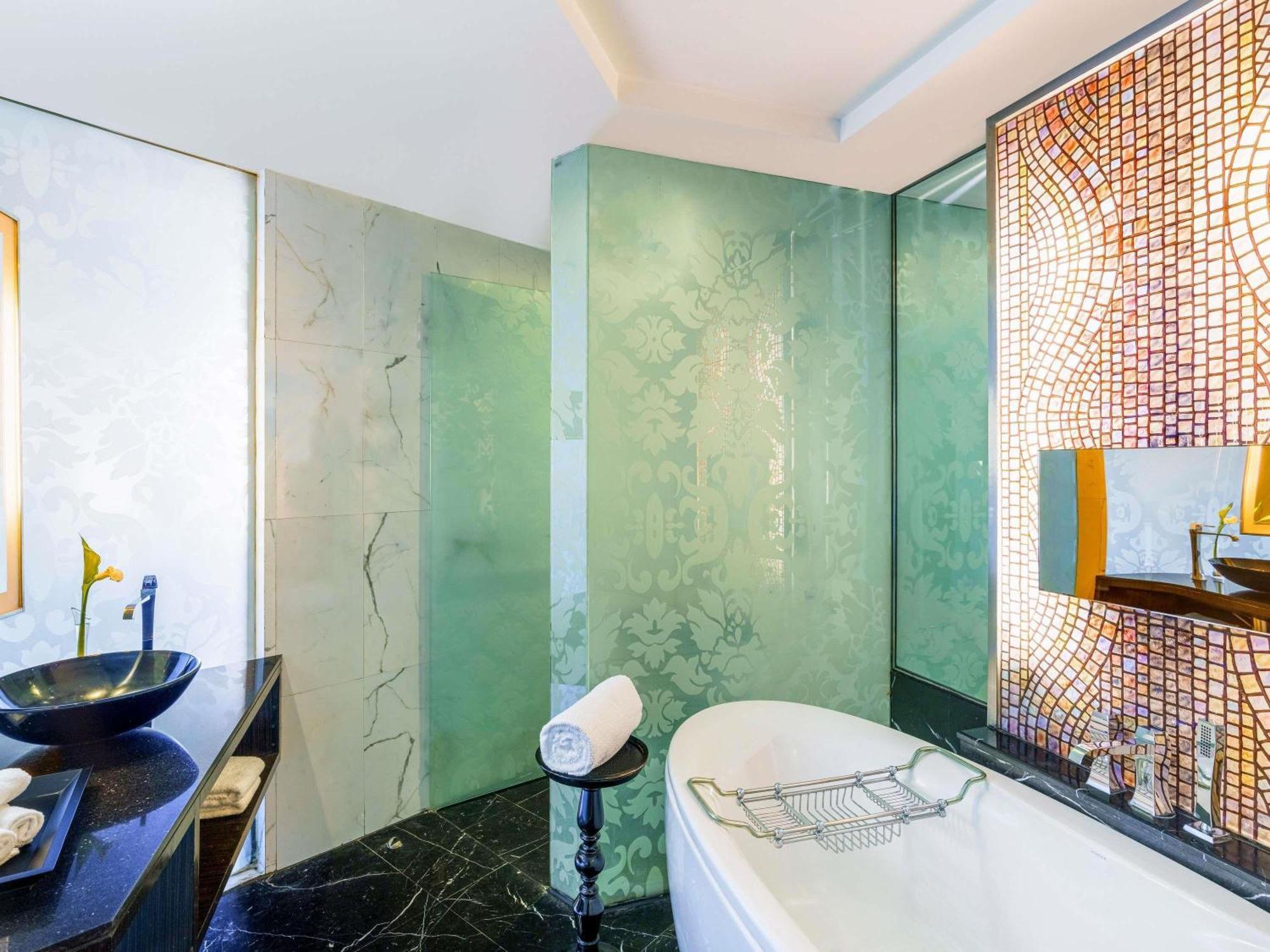 Junior Suite King Bed Lounge Access Hi-tea Cocktail Hours Meeting Room access an Hour Airport Transfers T1 & T2