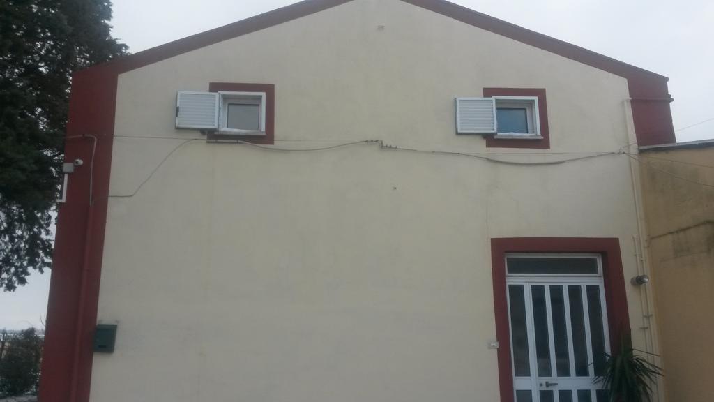 Camera Familiare con Bagno in Comune