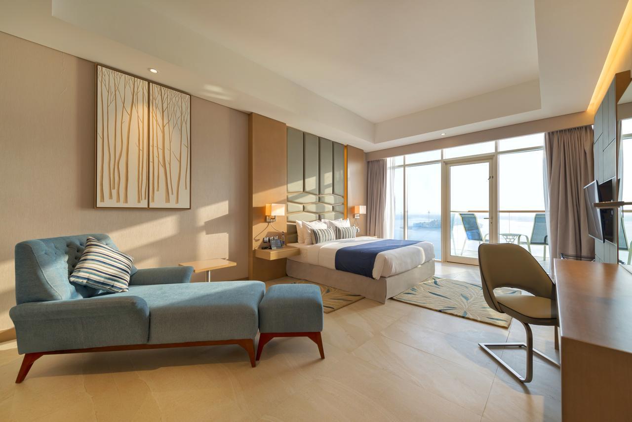 One-Bedroom Suite With Sea View and Hotel Private Beach Access,670376295:JPEG