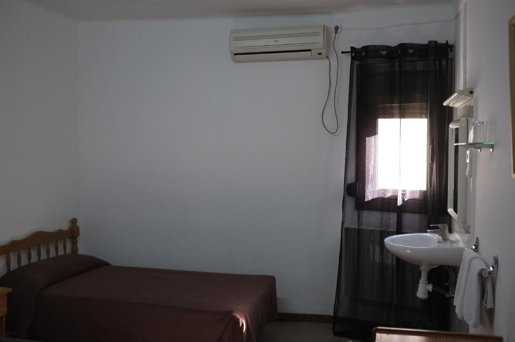 Camera Singola con Bagno in Comune