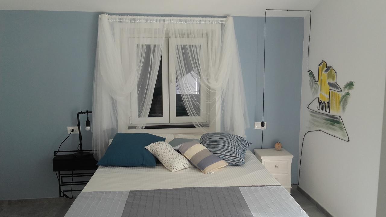 Double Room with Balcony (2 Adults + 1 Child),668127588:JPEG