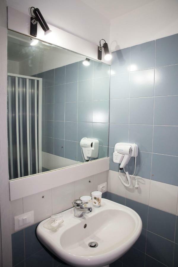 Camera Quadrupla con Bagno in Comune