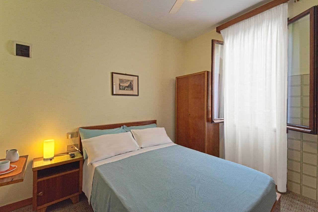 Camera Singola con Bagno in Comune
