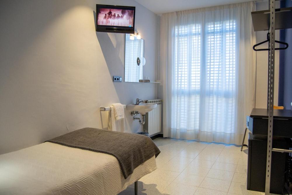Camera Singola con Bagno in Comune